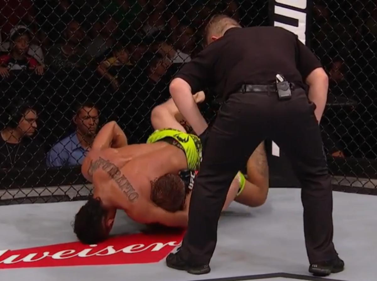 Charles Oliveira submits Nik Lentz with a mounted guillotine in their rematch, photo: UFC Fight Pass